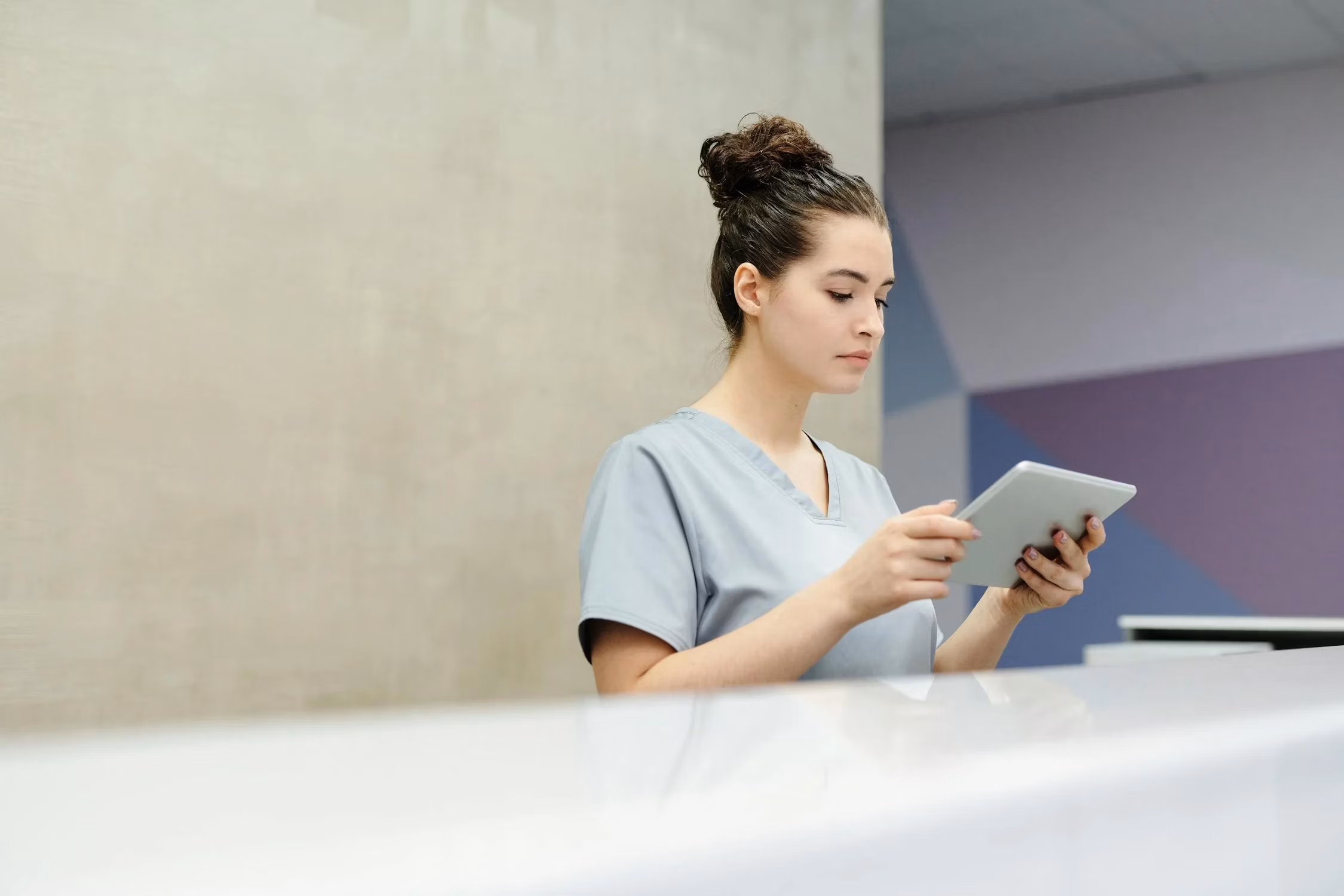 Person reading a tablet